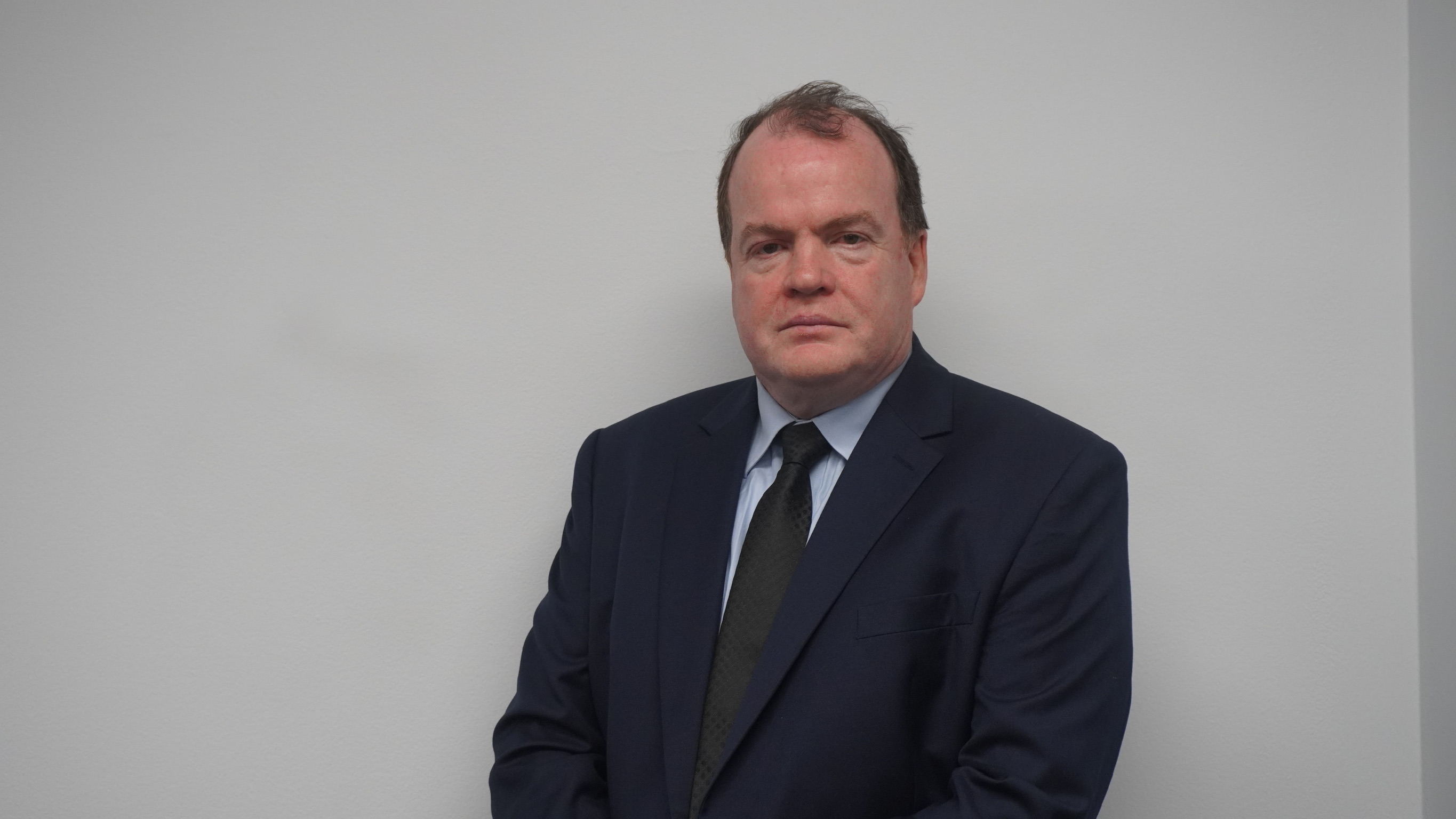 Headshot of John Gallagher